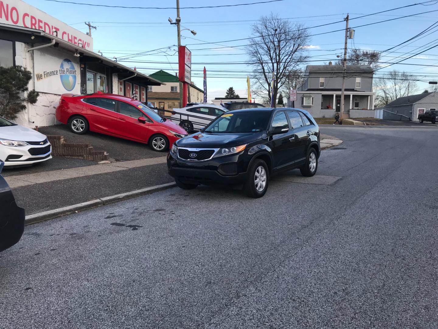 2011 Black /Gray Kia Sorento LX (5XYKT3A10BG) with an 2.4 V4 engine, Automatic transmission, located at 577 Chester Pike, Prospect Park, PA, 19076, (610) 237-1015, 39.886154, -75.302338 - Photo#1